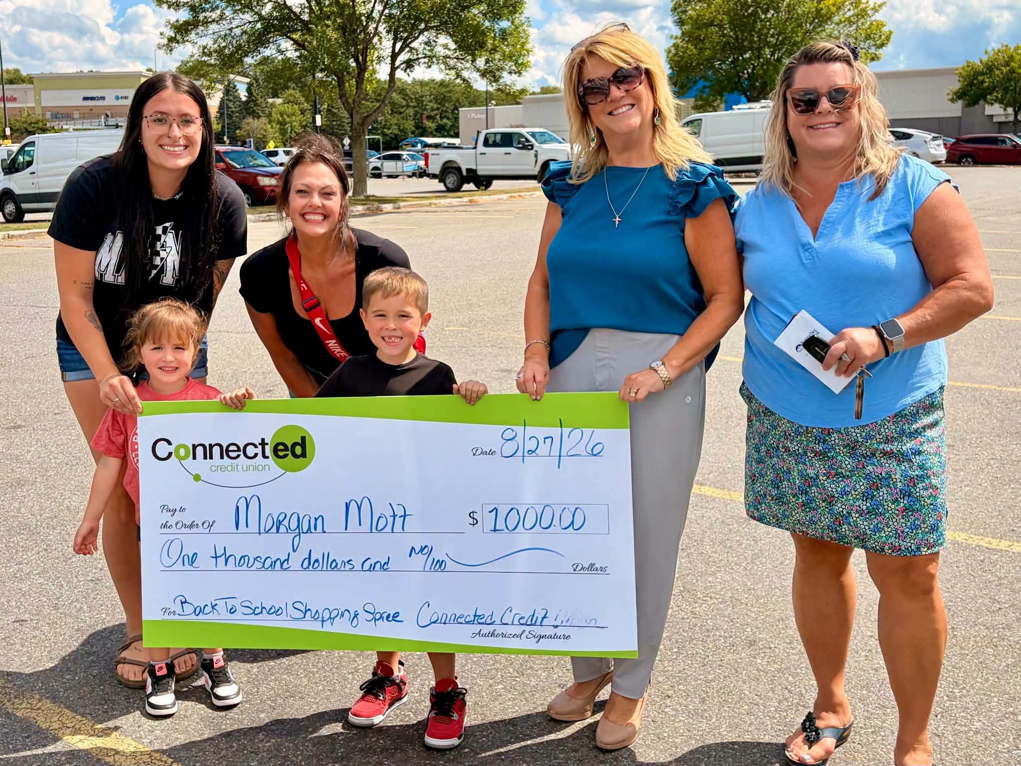 Winner Morgan M. with her family